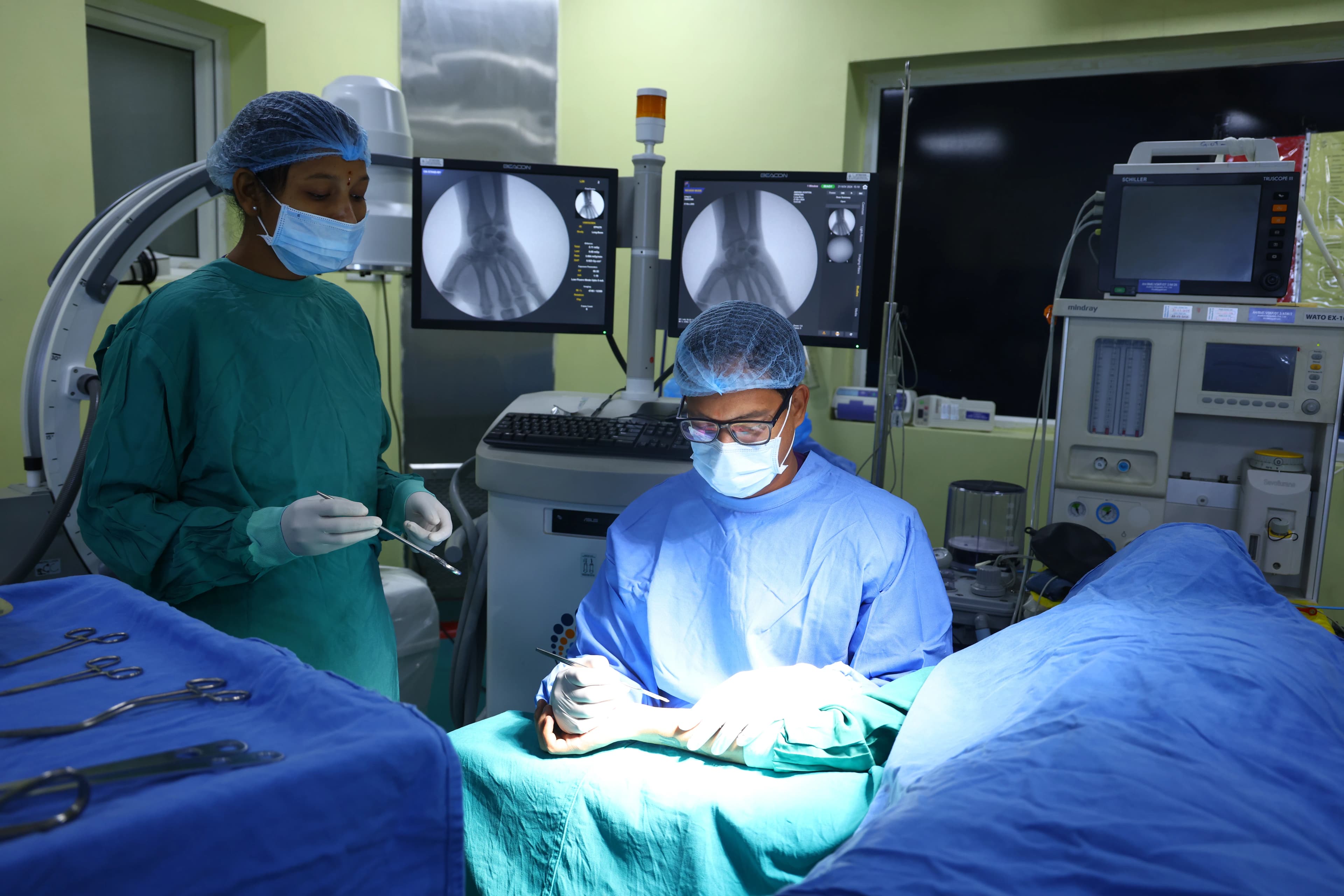 Orthopaedic surgeon performing advanced joint replacement procedure
